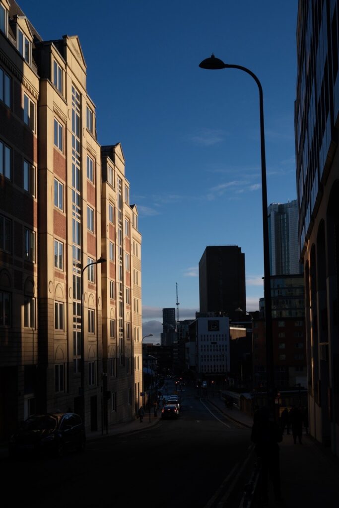 MaBirmingham photowalk capturing winter street photography and long shadows.rcin Walk