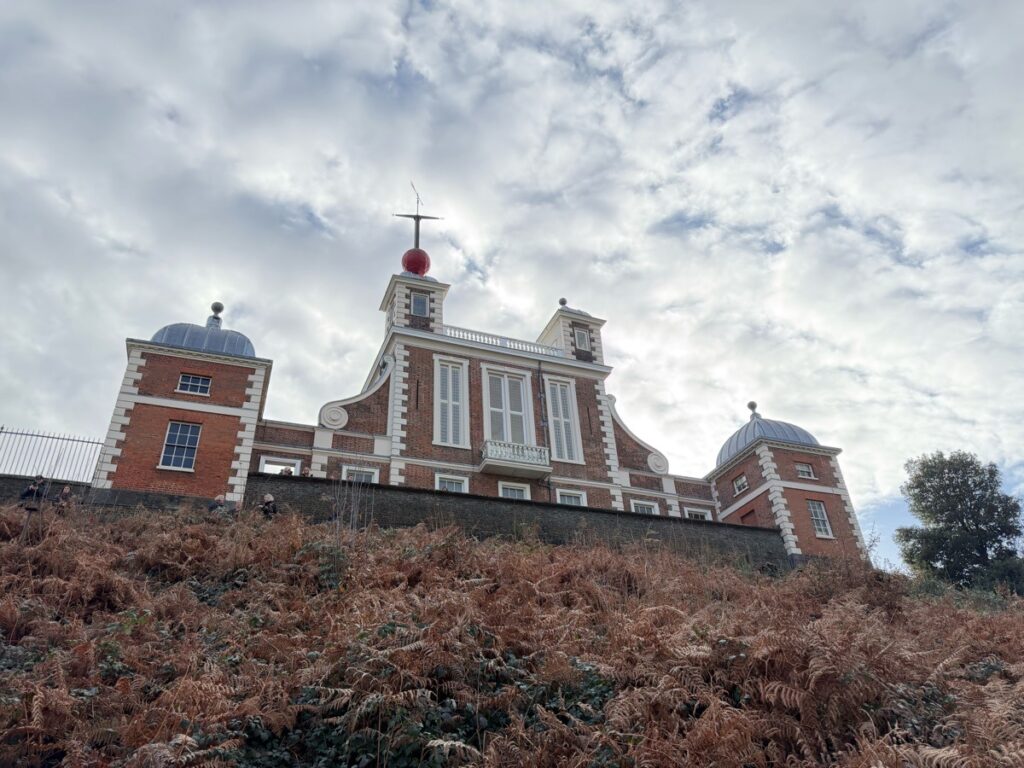 The Royal Greenwich Observatory towering above the town.