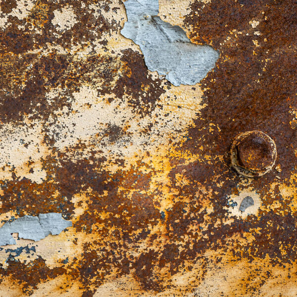 Stannels Bridge shows patterns of rust and peeling paintwork.