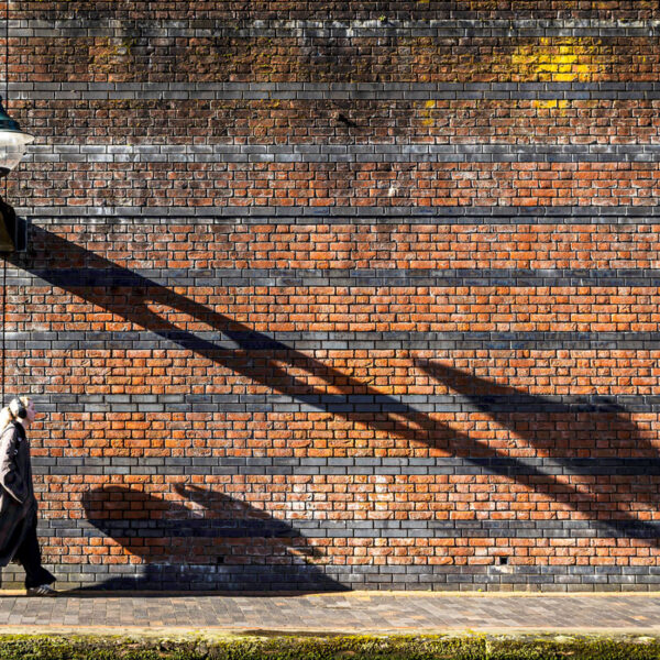A long shadow on the towpath near to Brindley Place.