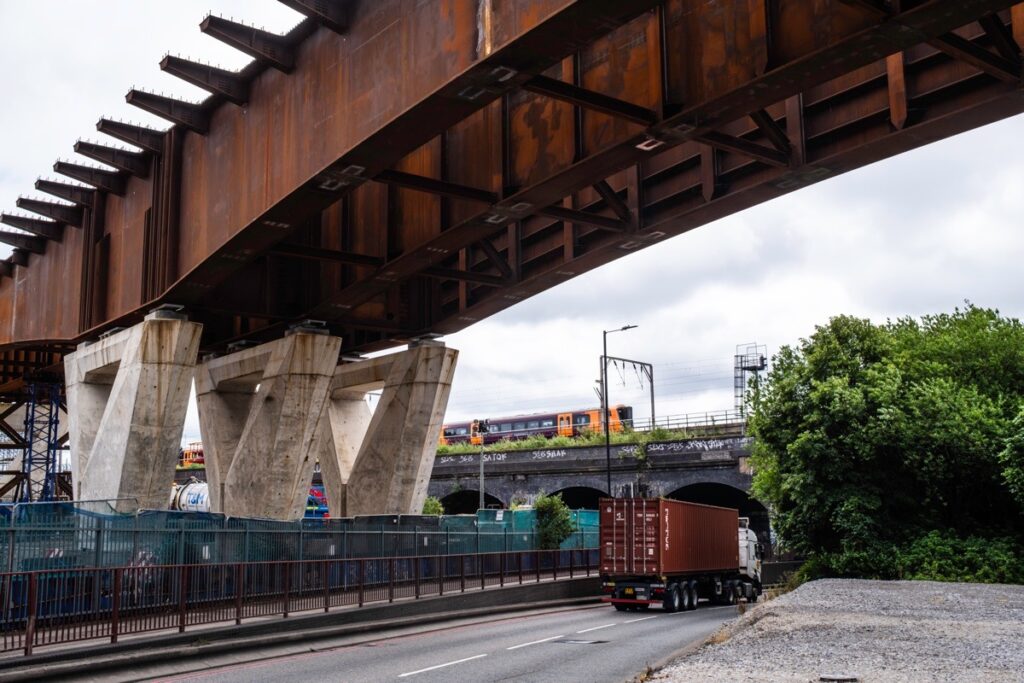 Photographing Digbeth: A local train passes by the larger HS2 bridge over Lawley Middleway,