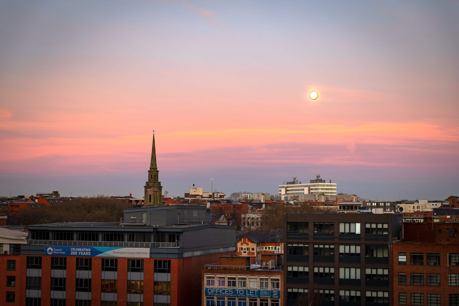 The moon still over St Paul's Church