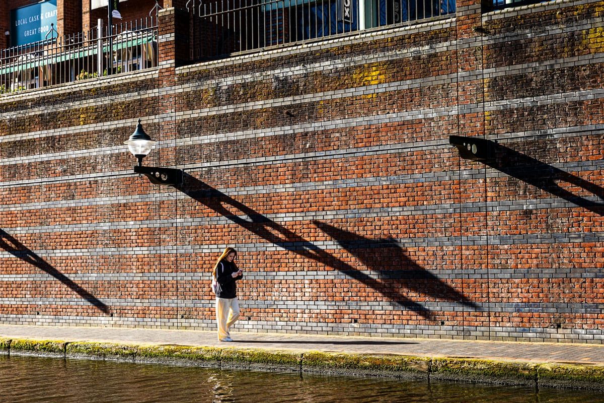 An overview of the shadows created by the early morning sun at Brindley place.