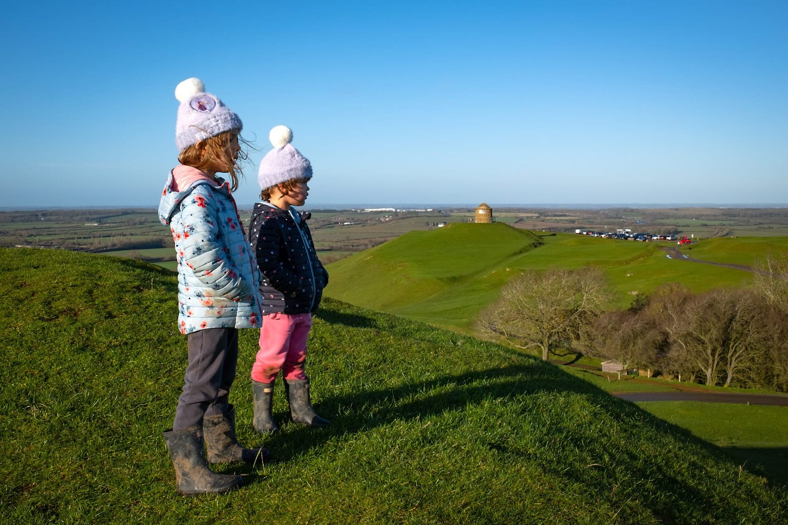 Lily and Chloe look out from the top of Magpie Hill