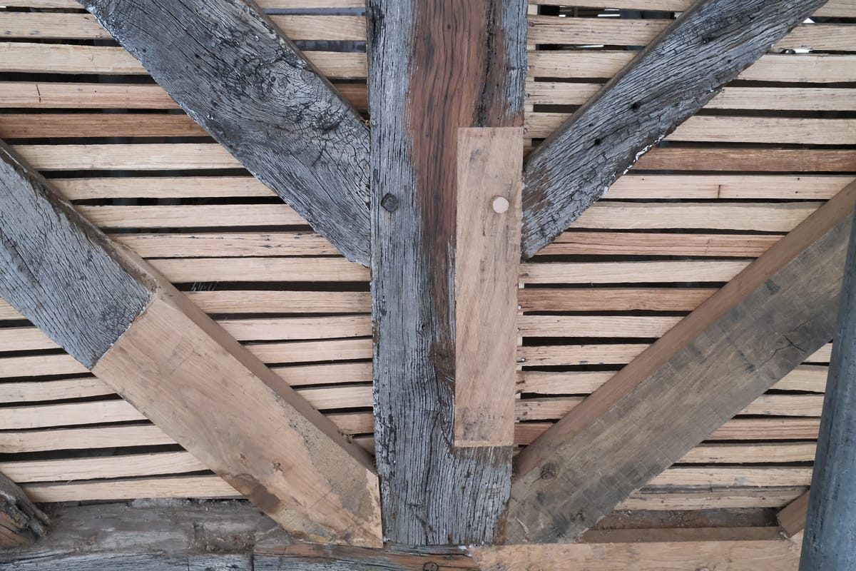 Old and New Timber Joinery
Detail showing new timber carefully joined with original wood during Golden Lion restoration.