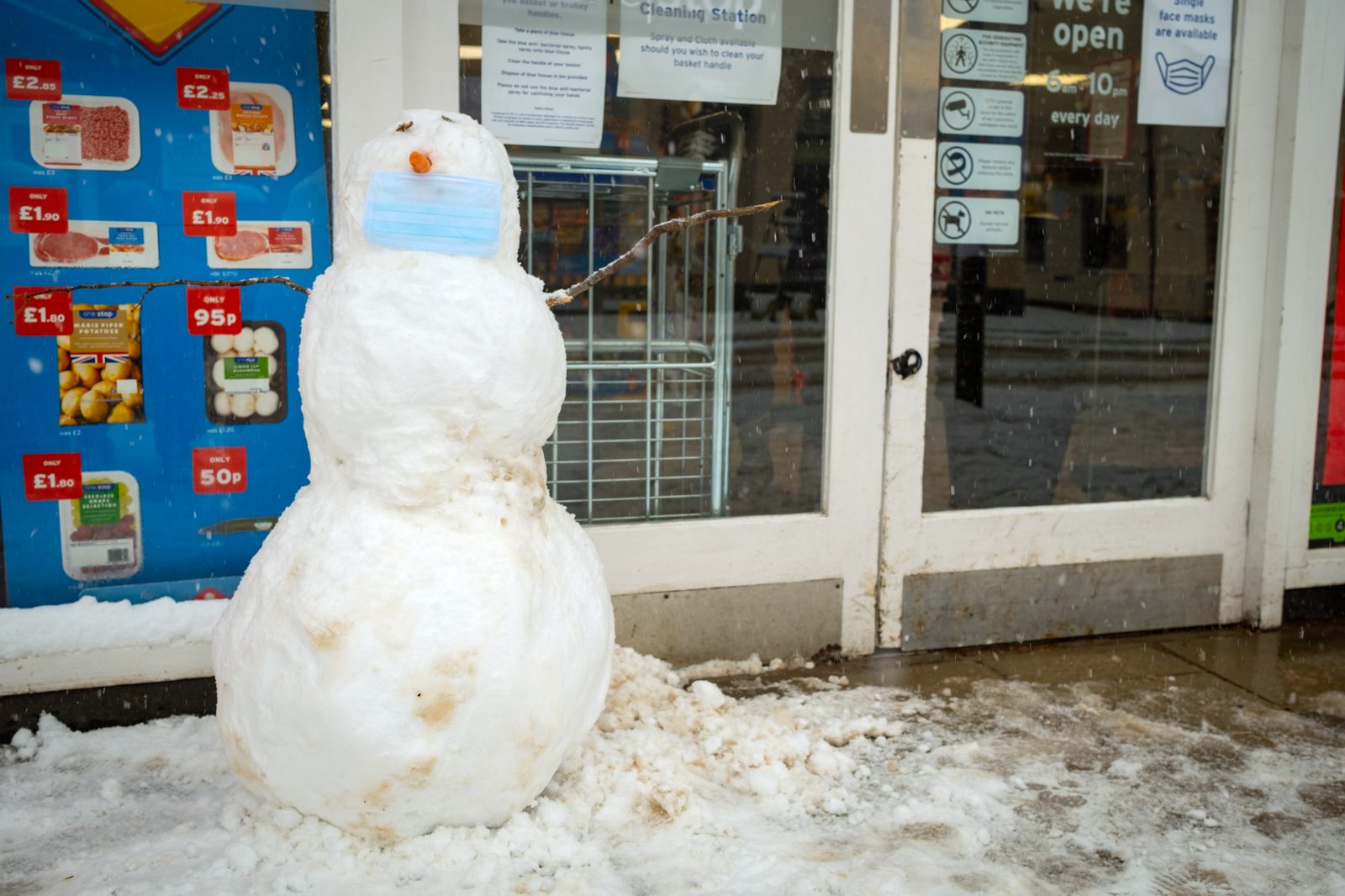 Snowman with a facemask