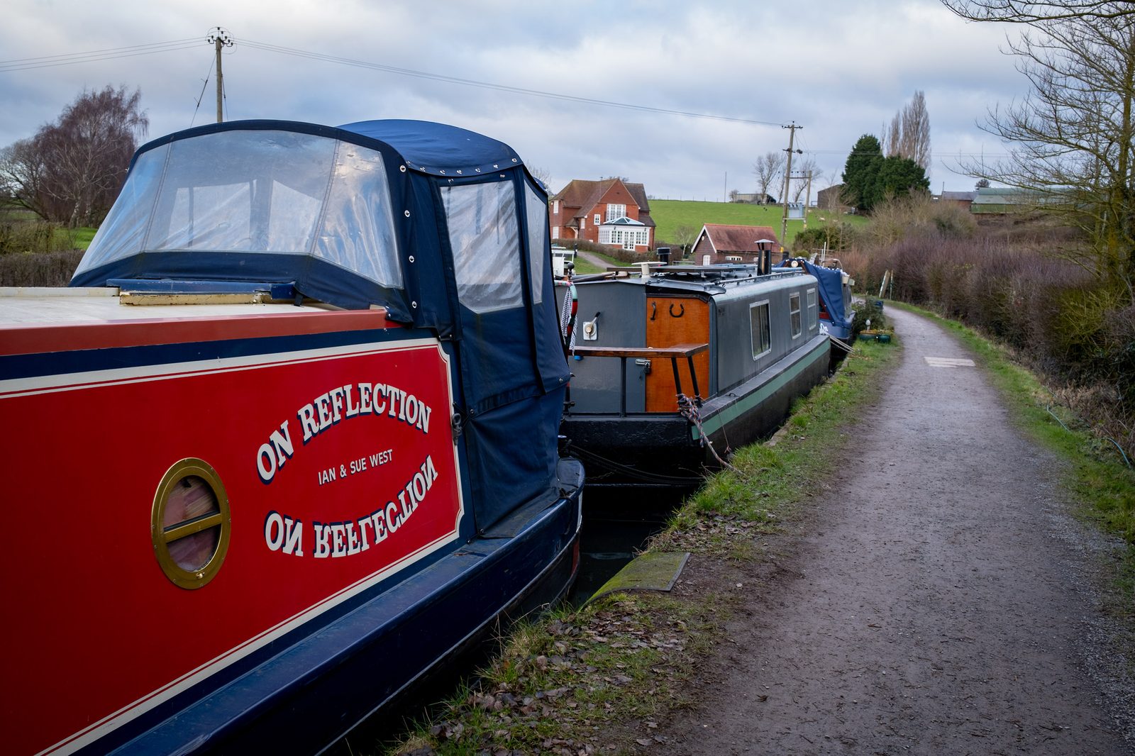 The smell of wood burners as you pass the long boats