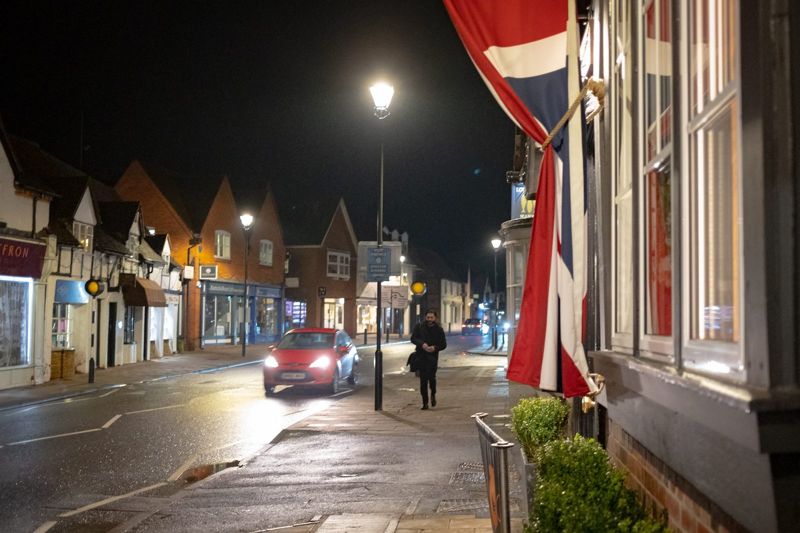 Car lights in the High Street