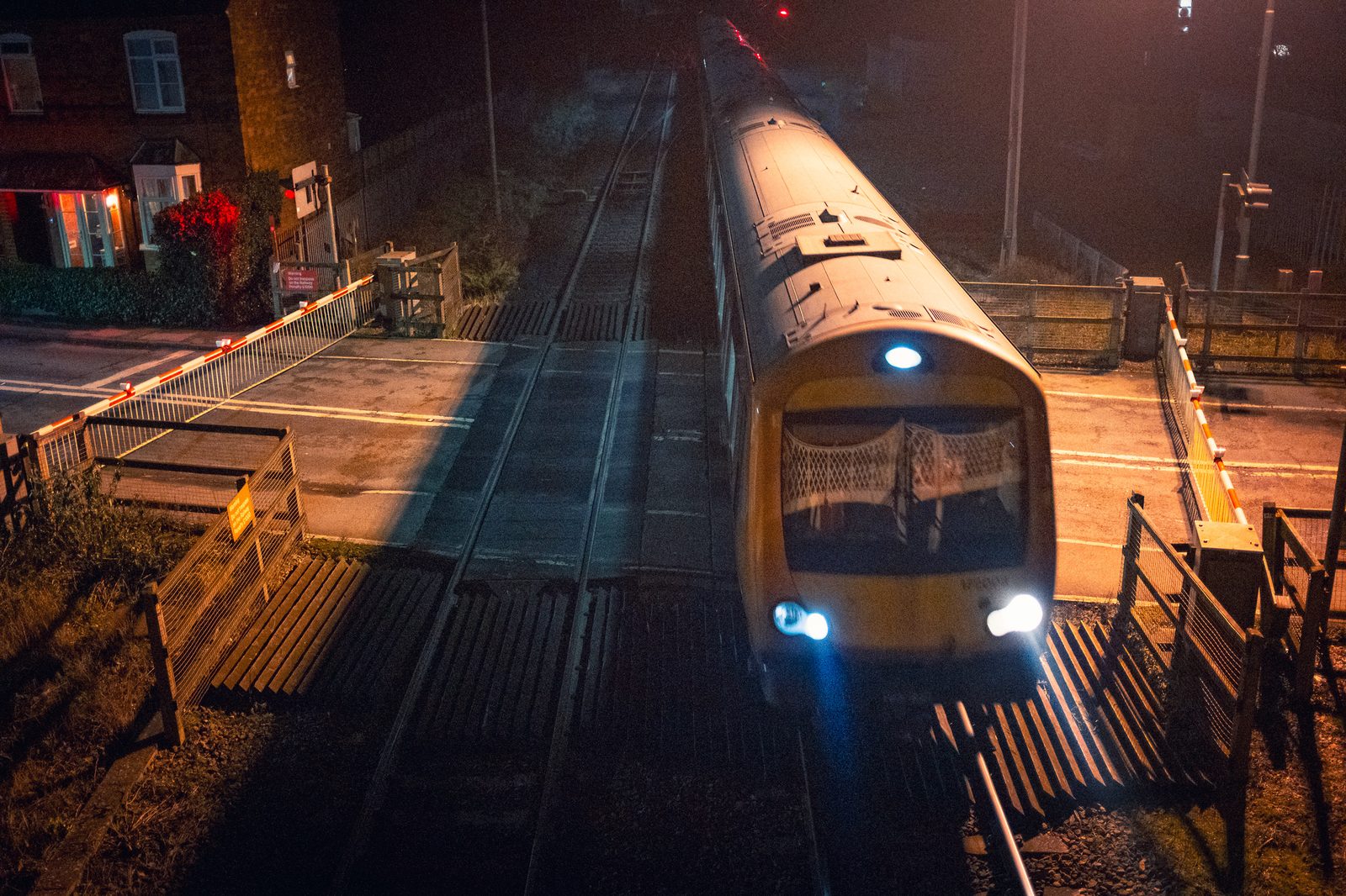 Train approaching the level crossing