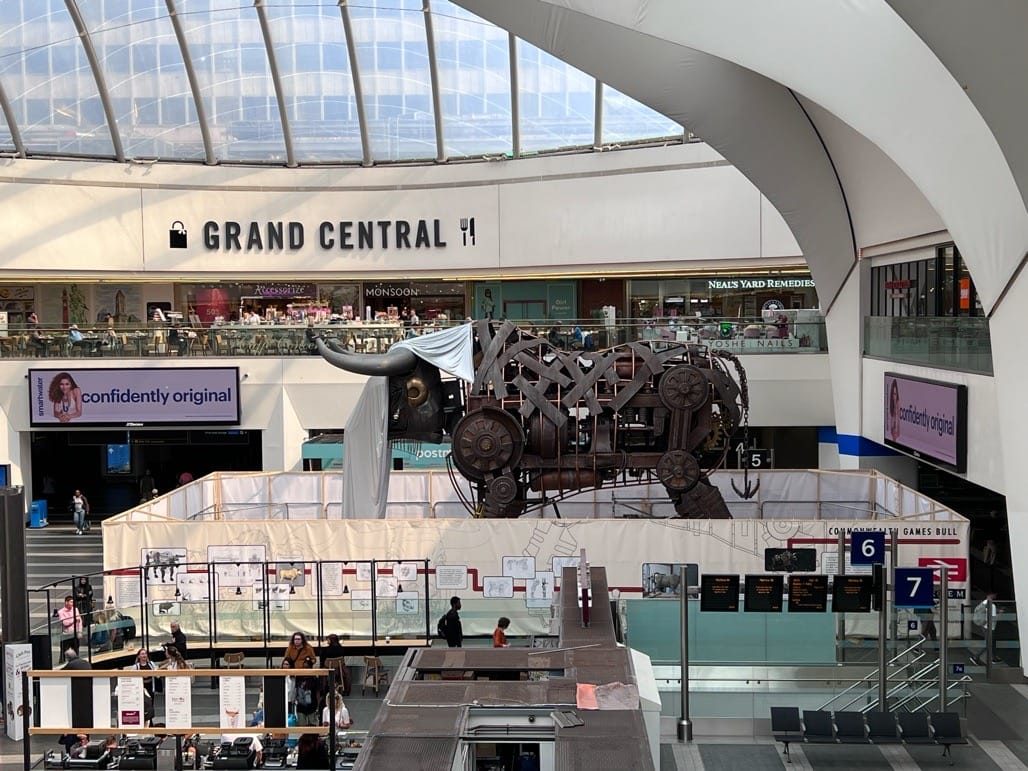 Ozzy the Bull arrives in New Street station, Birmingham. 2023