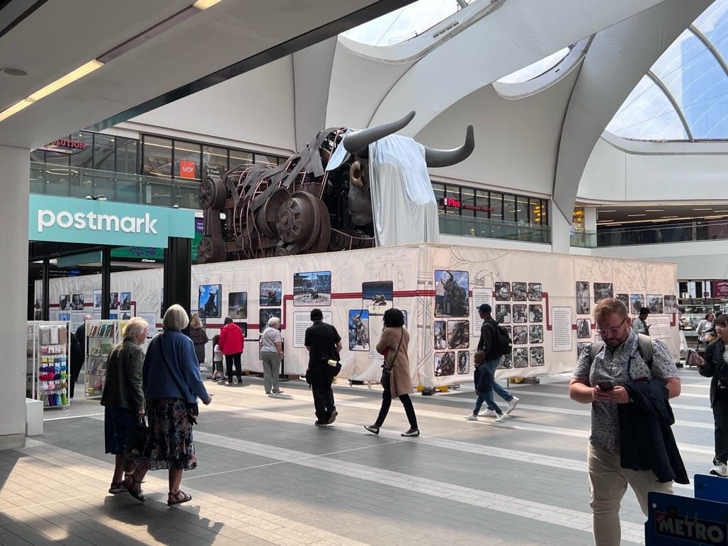 Ozzy the Bull arrives in New Street station, Birmingham. 2023
