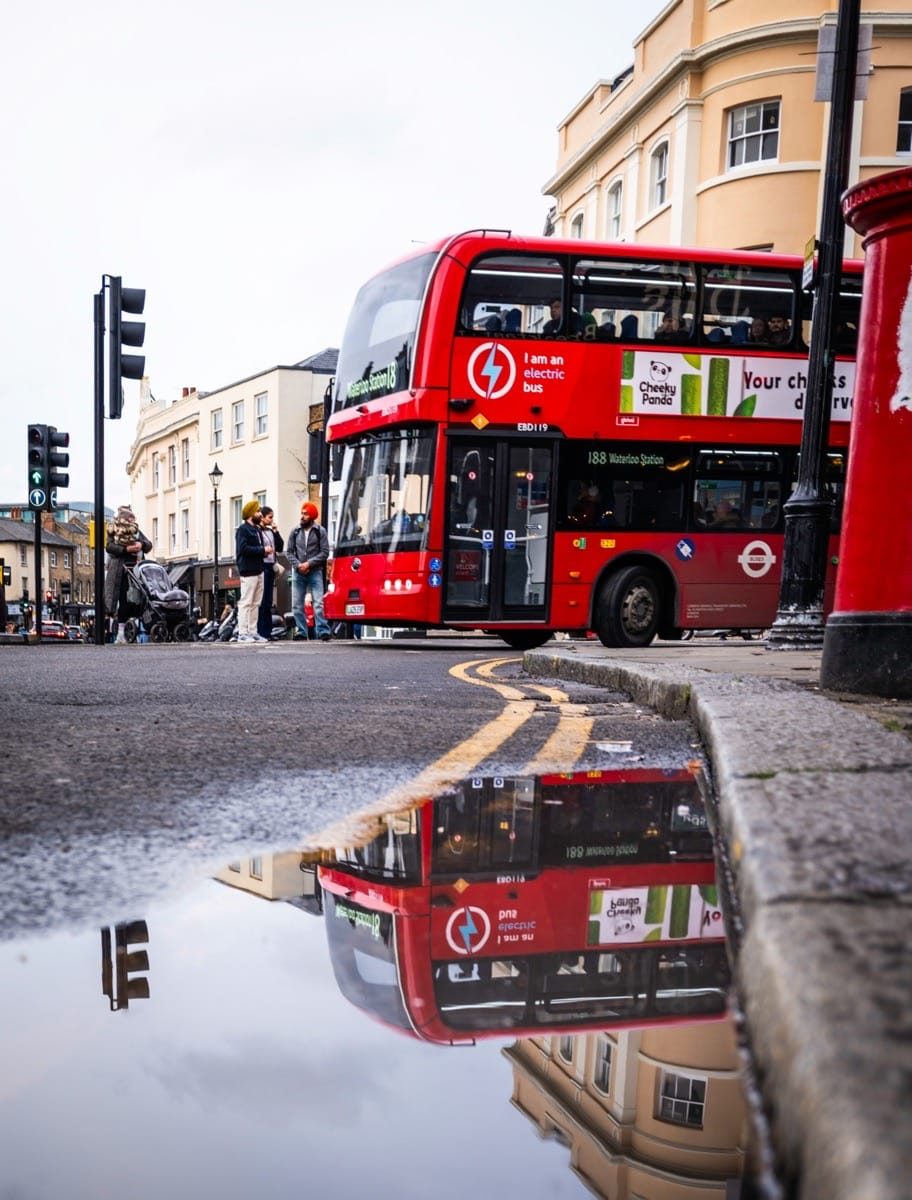 Busy Greenwich Market scene with reflections and natural light