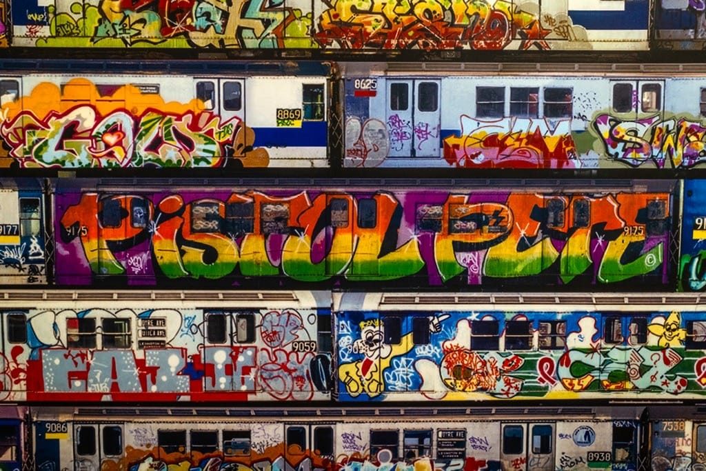The picture shows several boards with the subway trains meticulously photographed in their number order. 