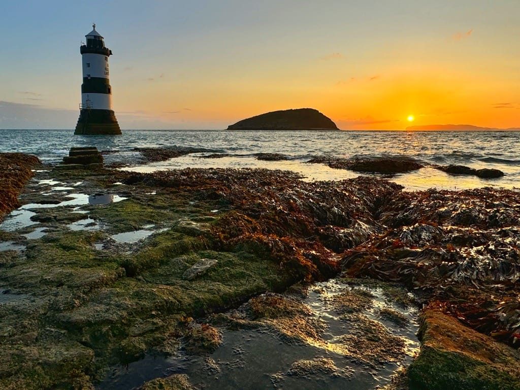 Photographing the sunrise at Trwyn Penmon point, Anglesey